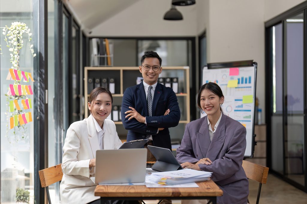 Portrait Happy Group Of Asian Business People Meeting For Start