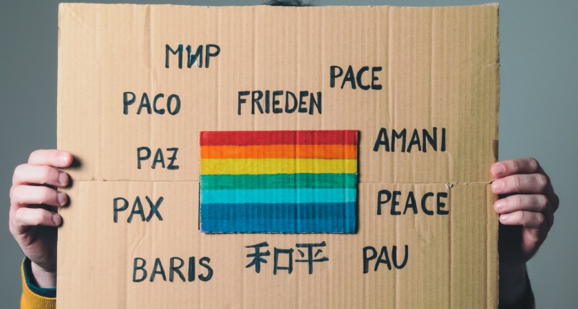 girl-raises-peace