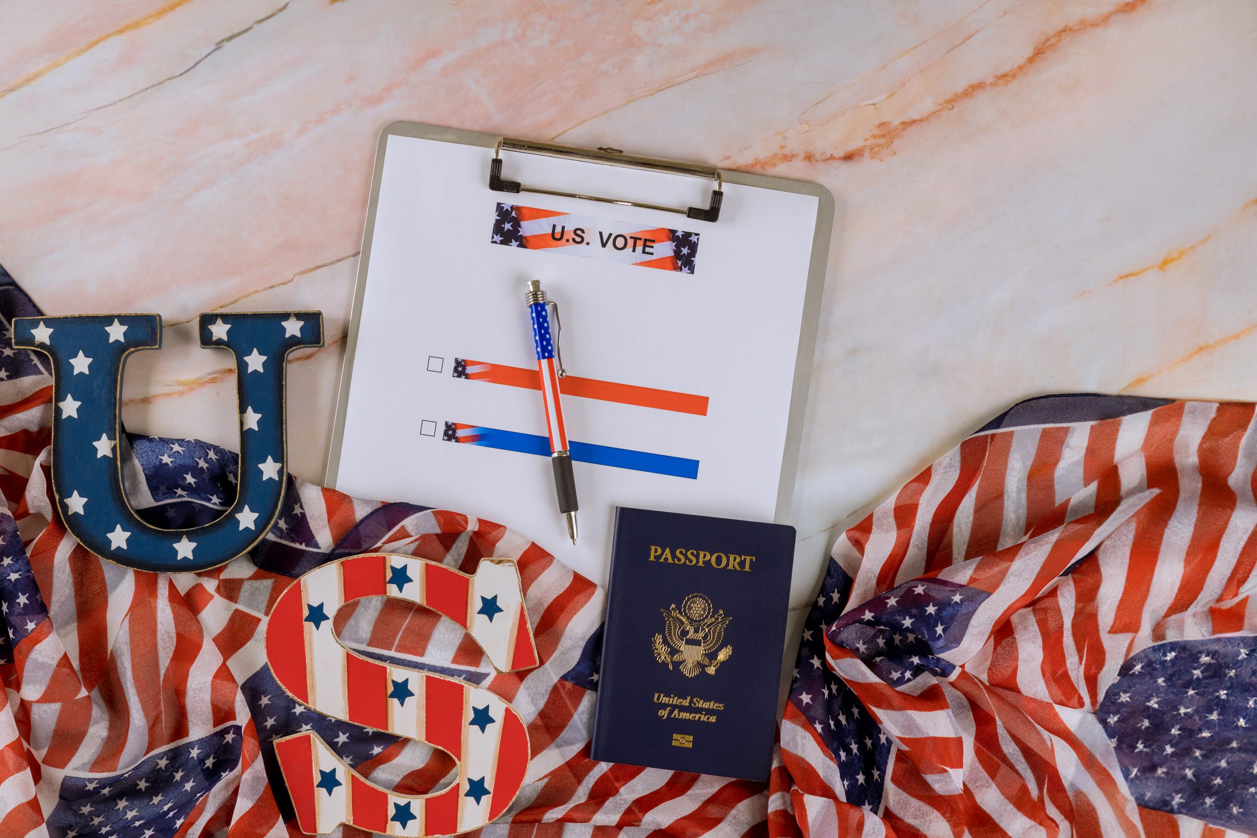 American passport, American flag, voting ballot for a US presidential election